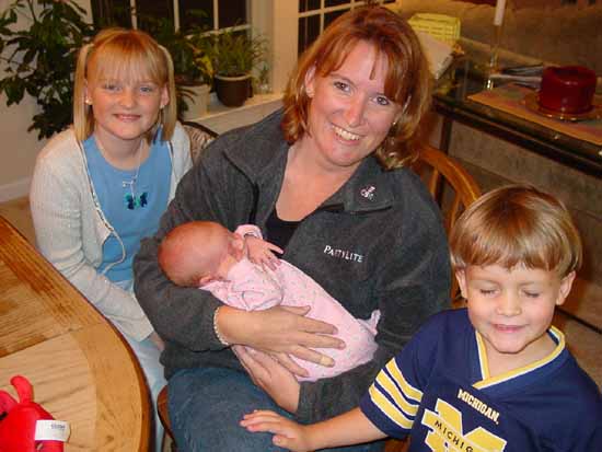 Emily with Aunt Karen and cousins Samantha and Timothy.