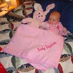 Emily with her two presents from Aunt Ali - a rabbit and a beautiful blanket.