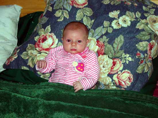 Emily sitting in bed.