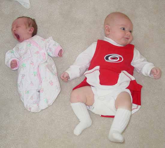 This is 15 week old Emily with her new friend 1 week old Hannah.