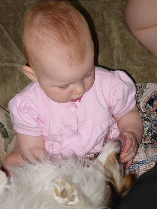 Emily playing with her dog.