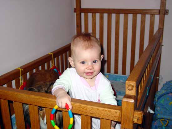 Emily in the crib with Ripley