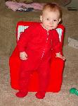 She's thinking of sitting in the Elmo Chair.